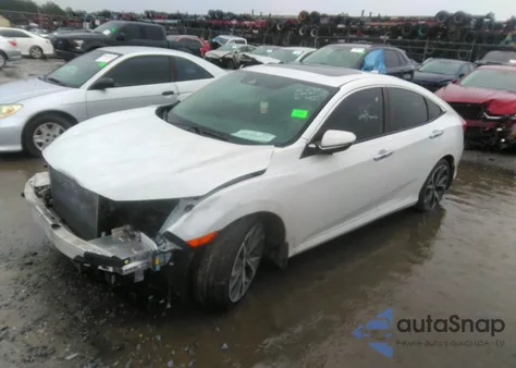 2019 Honda Civic Touring z USA, uszkodzony, nr VIN JHMFC1F90KX002322